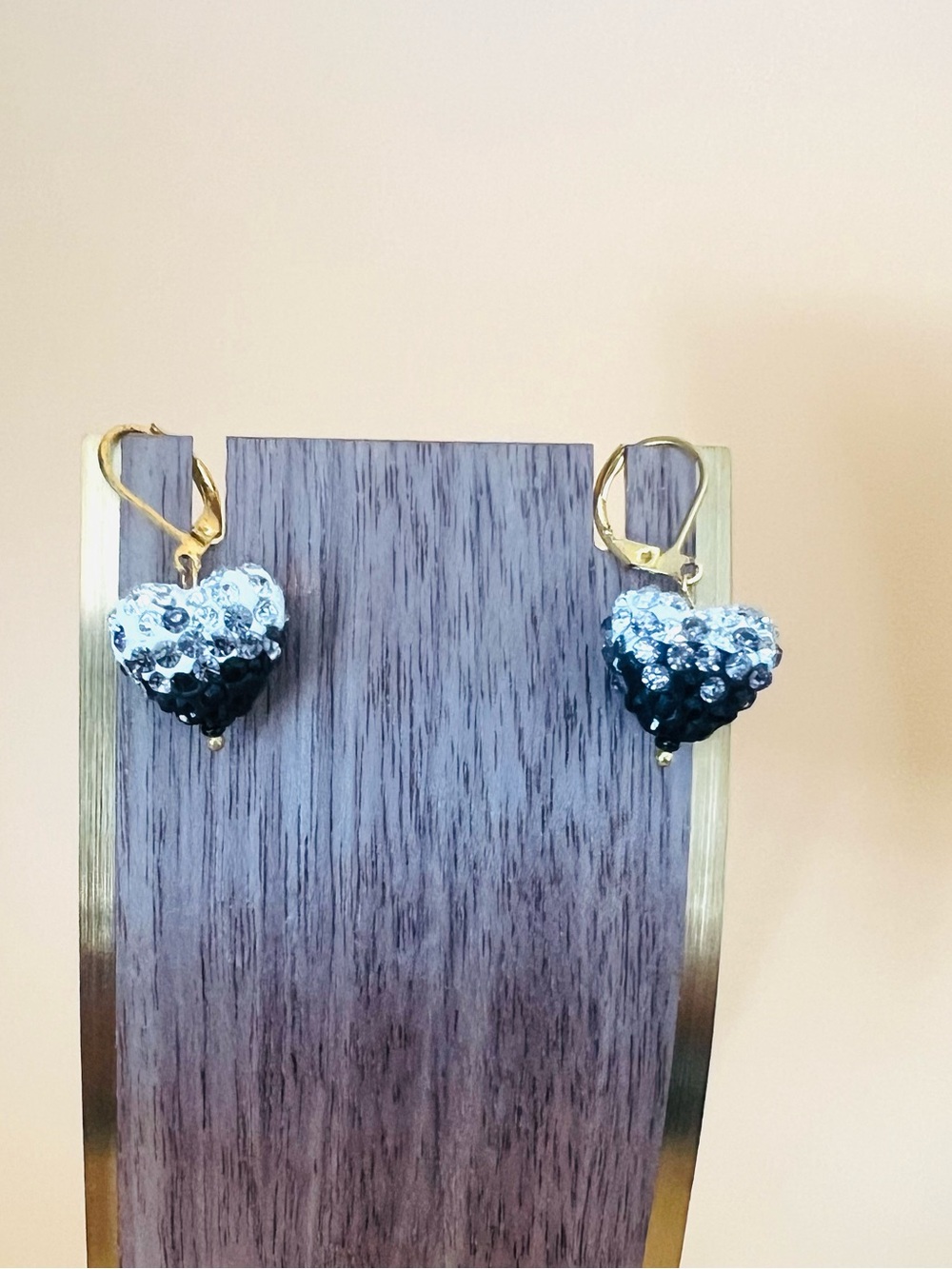 Festive 14 KGP paved black & white heart earrings